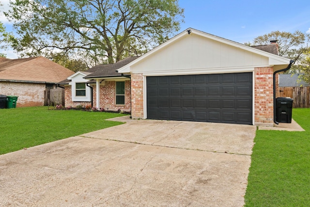 ranch-style house with a garage and a front lawn