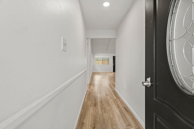 hallway featuring light hardwood / wood-style flooring