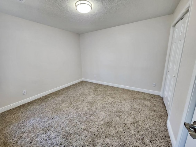 interior space featuring a textured ceiling