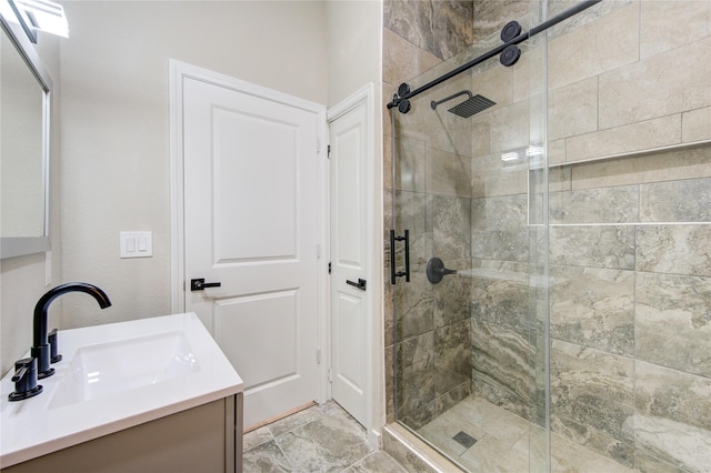 bathroom with vanity and walk in shower