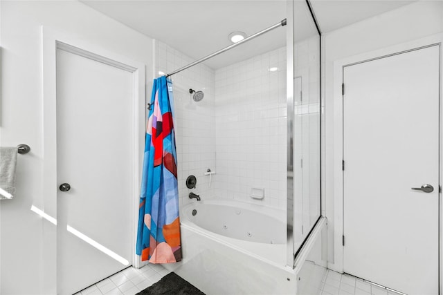 bathroom with tile patterned flooring and shower / tub combo with curtain