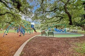 view of home's community featuring a playground