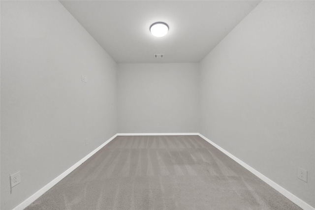 spare room with carpet floors