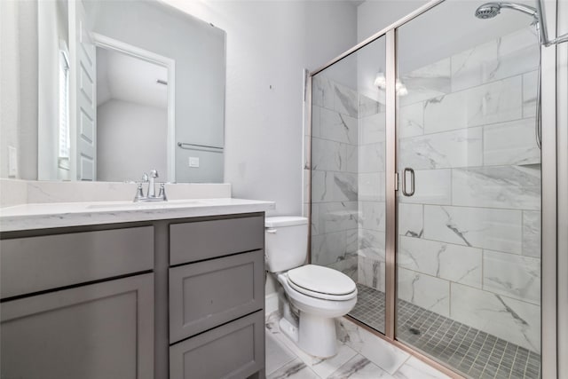 bathroom featuring walk in shower, vanity, and toilet