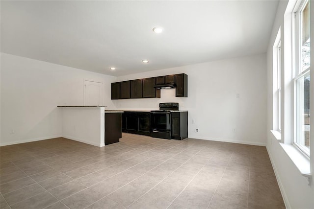 kitchen featuring black range with electric stovetop and light tile patterned flooring