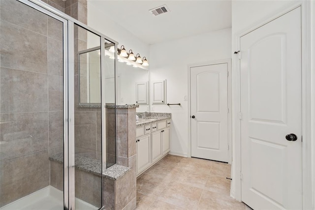 bathroom with vanity and walk in shower