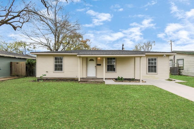 single story home featuring a front lawn