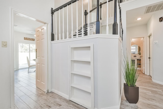 interior space featuring hardwood / wood-style floors and ceiling fan