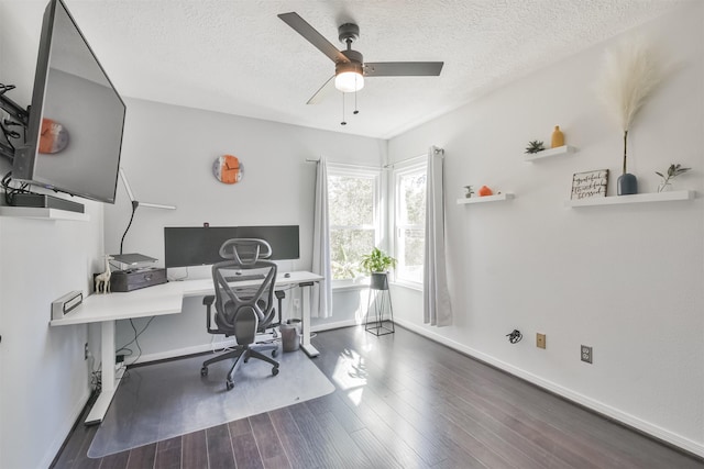 office space featuring a textured ceiling, dark hardwood / wood-style floors, and ceiling fan