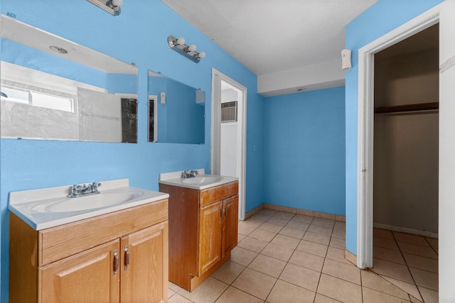 bathroom featuring tile patterned floors and vanity