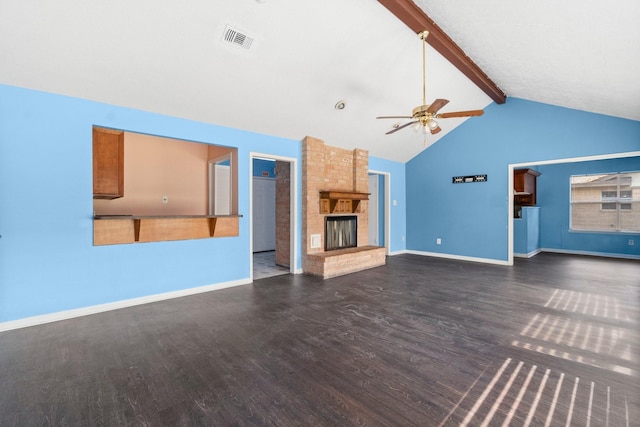 unfurnished living room featuring vaulted ceiling with beams, ceiling fan, dark wood-type flooring, and a brick fireplace