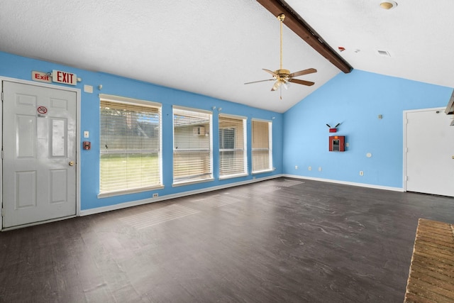 unfurnished living room featuring a textured ceiling, ceiling fan, lofted ceiling with beams, and dark hardwood / wood-style floors