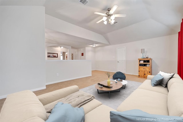 living room featuring ceiling fan, light carpet, and lofted ceiling