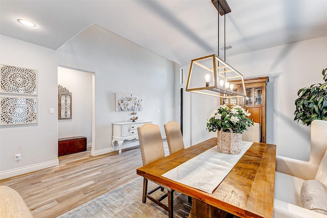 dining room with light wood-type flooring