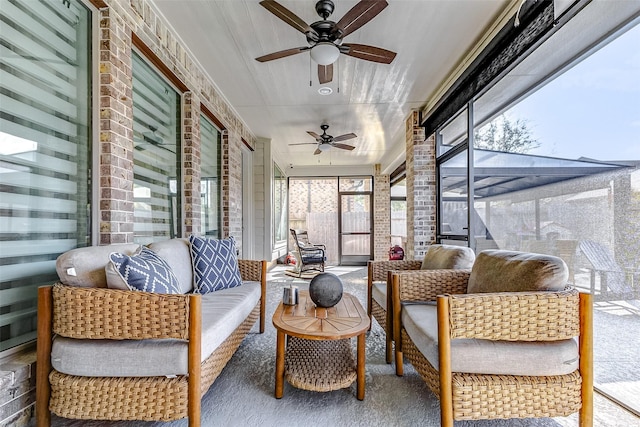 sunroom / solarium with ceiling fan