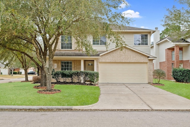 view of front facade with a front yard and a garage