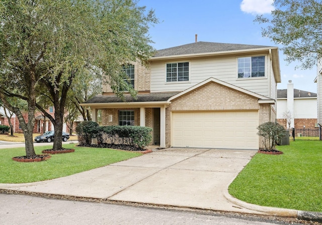 front facade with a garage and a front lawn