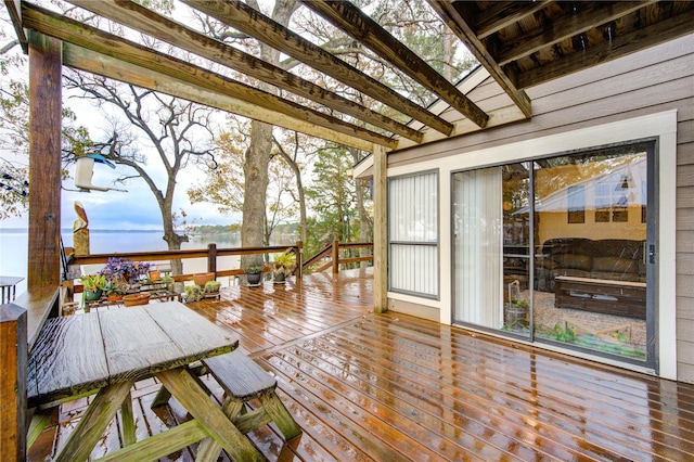 wooden terrace with a water view