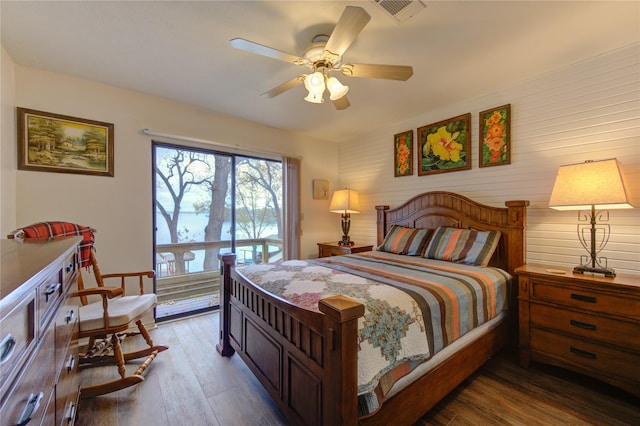 bedroom with hardwood / wood-style flooring and ceiling fan