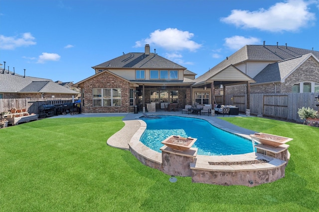 view of pool with a fenced in pool, an outdoor living space with a fire pit, a lawn, a fenced backyard, and a patio area