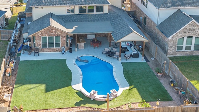 view of pool featuring an outdoor living space and a patio