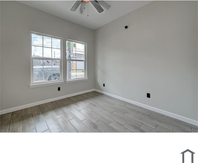 unfurnished room with ceiling fan and light hardwood / wood-style flooring