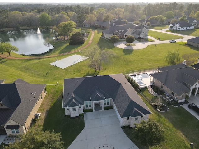 bird's eye view with a water view