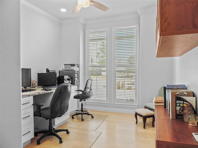 office area with ceiling fan, light wood-type flooring, and ornamental molding