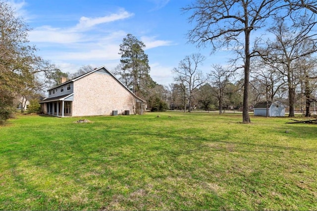 view of yard featuring a sunroom