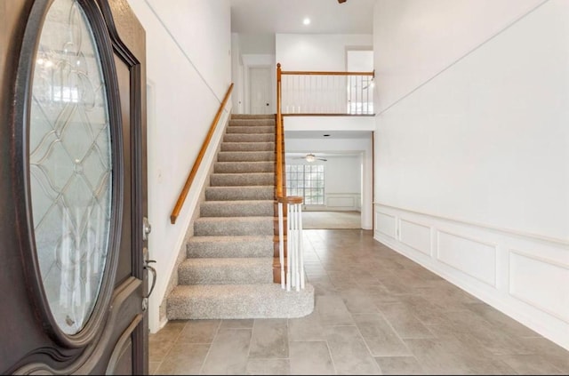 entryway with ceiling fan