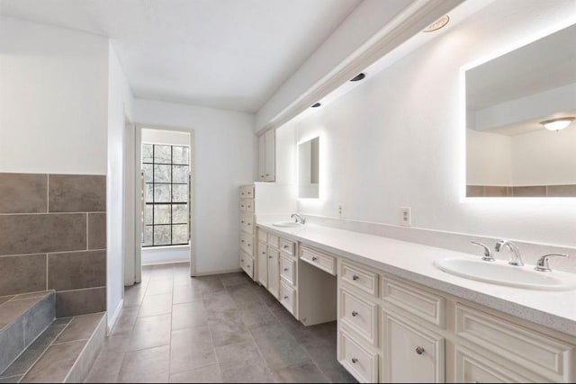 bathroom with vanity and tile patterned floors