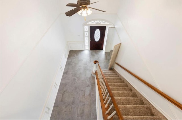 foyer featuring ceiling fan and dark hardwood / wood-style floors