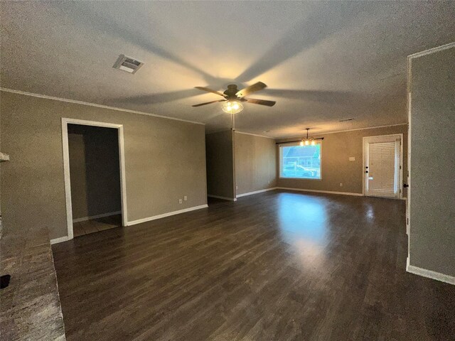 spare room with a ceiling fan, baseboards, visible vents, and dark wood-style floors