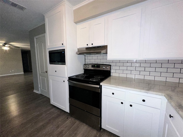 kitchen with stainless steel electric range oven, built in microwave, white cabinetry, under cabinet range hood, and dark wood-style floors