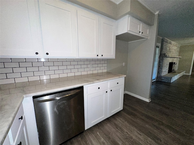 kitchen featuring white cabinets, dark wood-style flooring, dishwasher, baseboards, and backsplash