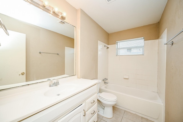 full bathroom featuring tile patterned floors, vanity, toilet, and tiled shower / bath