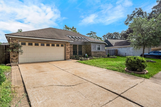 ranch-style home with a garage and a front lawn