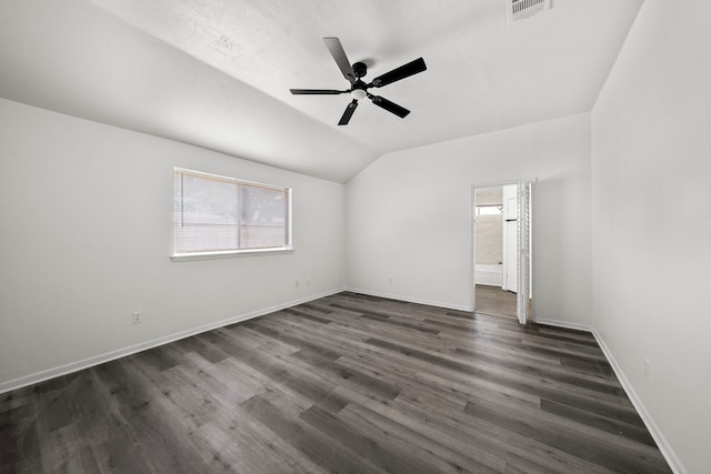 interior space featuring dark hardwood / wood-style floors, ceiling fan, and lofted ceiling