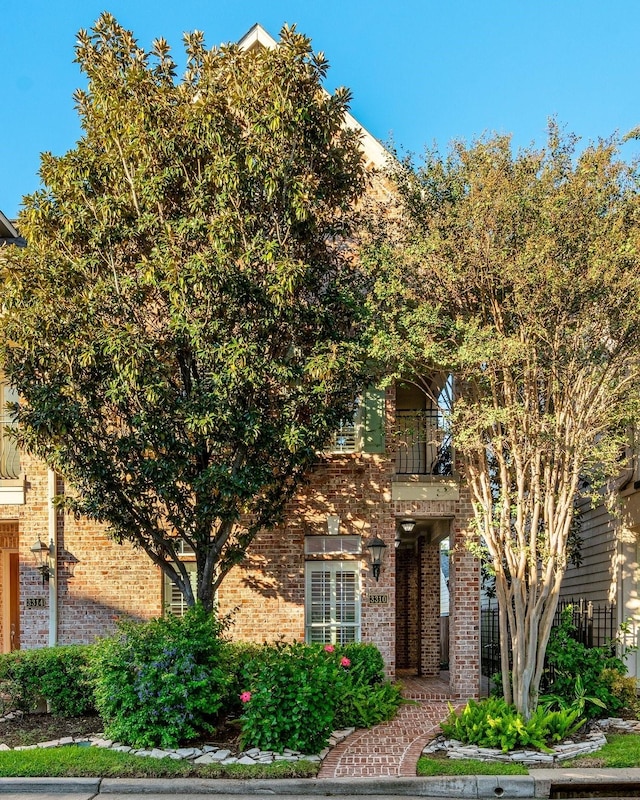 obstructed view of property featuring a balcony