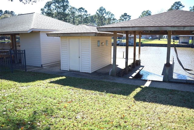 view of dock featuring a yard