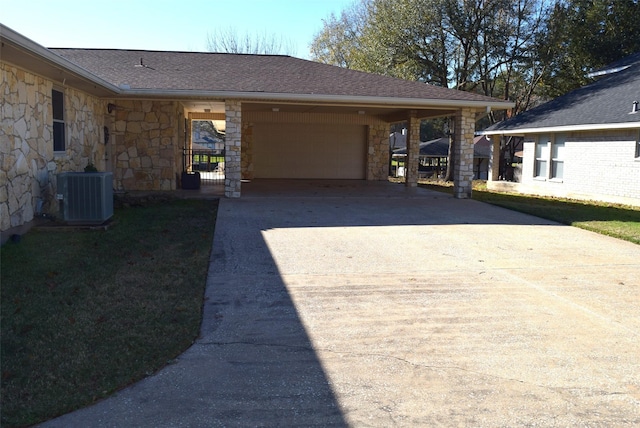 exterior space featuring a garage and cooling unit