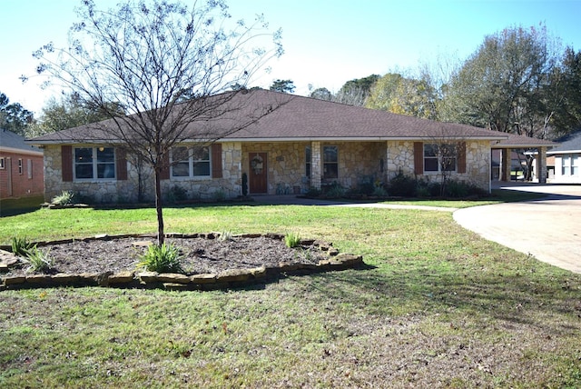 ranch-style house featuring a front lawn and a carport