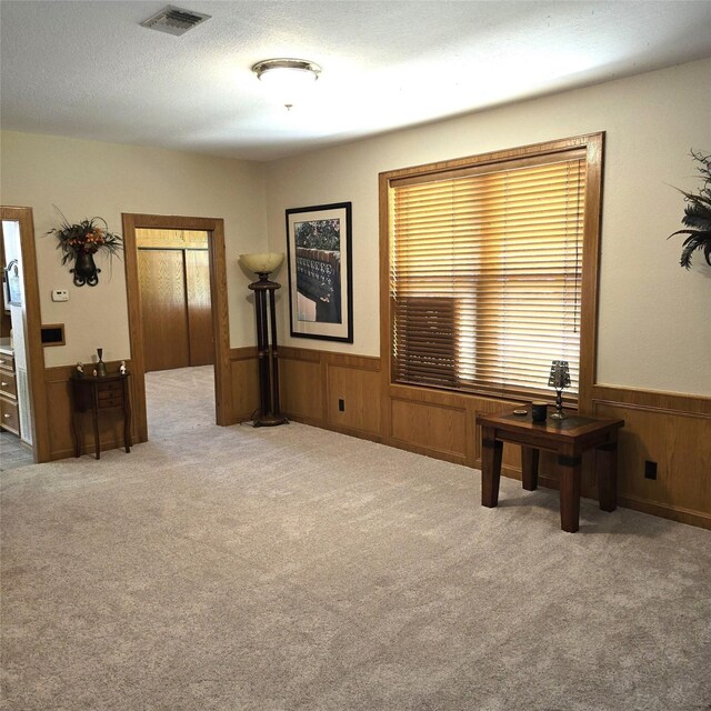 26 Westpoint Dr, Trinity, TX 75862 - carpeted office with wainscoting and wood walls