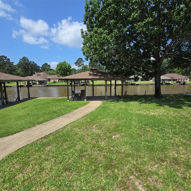 26 Westpoint Dr, Trinity, TX 75862 - view of grassy yard with a gazebo and a water view