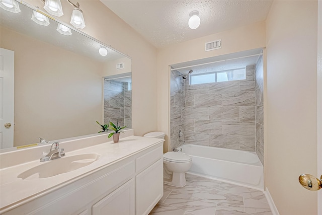 full bathroom featuring marble finish floor, visible vents, toilet, a textured ceiling, and vanity