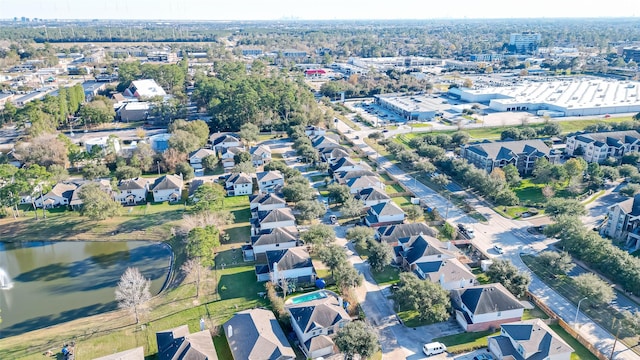 aerial view with a water view and a residential view