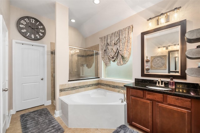 bathroom featuring tile patterned flooring, vanity, and independent shower and bath