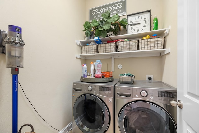 washroom with separate washer and dryer