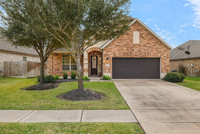 view of front facade featuring a front lawn and a garage