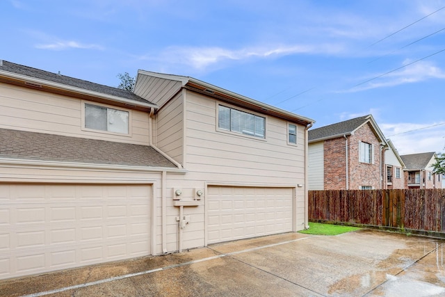 exterior space with a garage